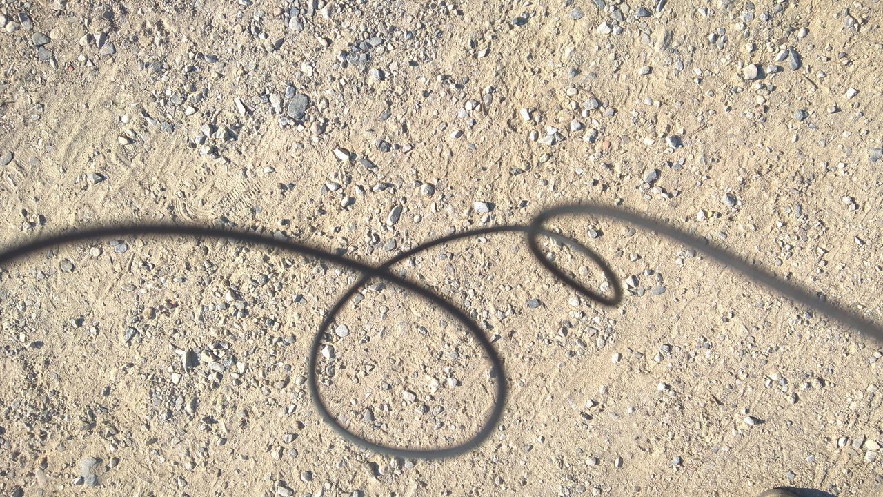 FULL FRAME SHOT OF SAND ON BEACH