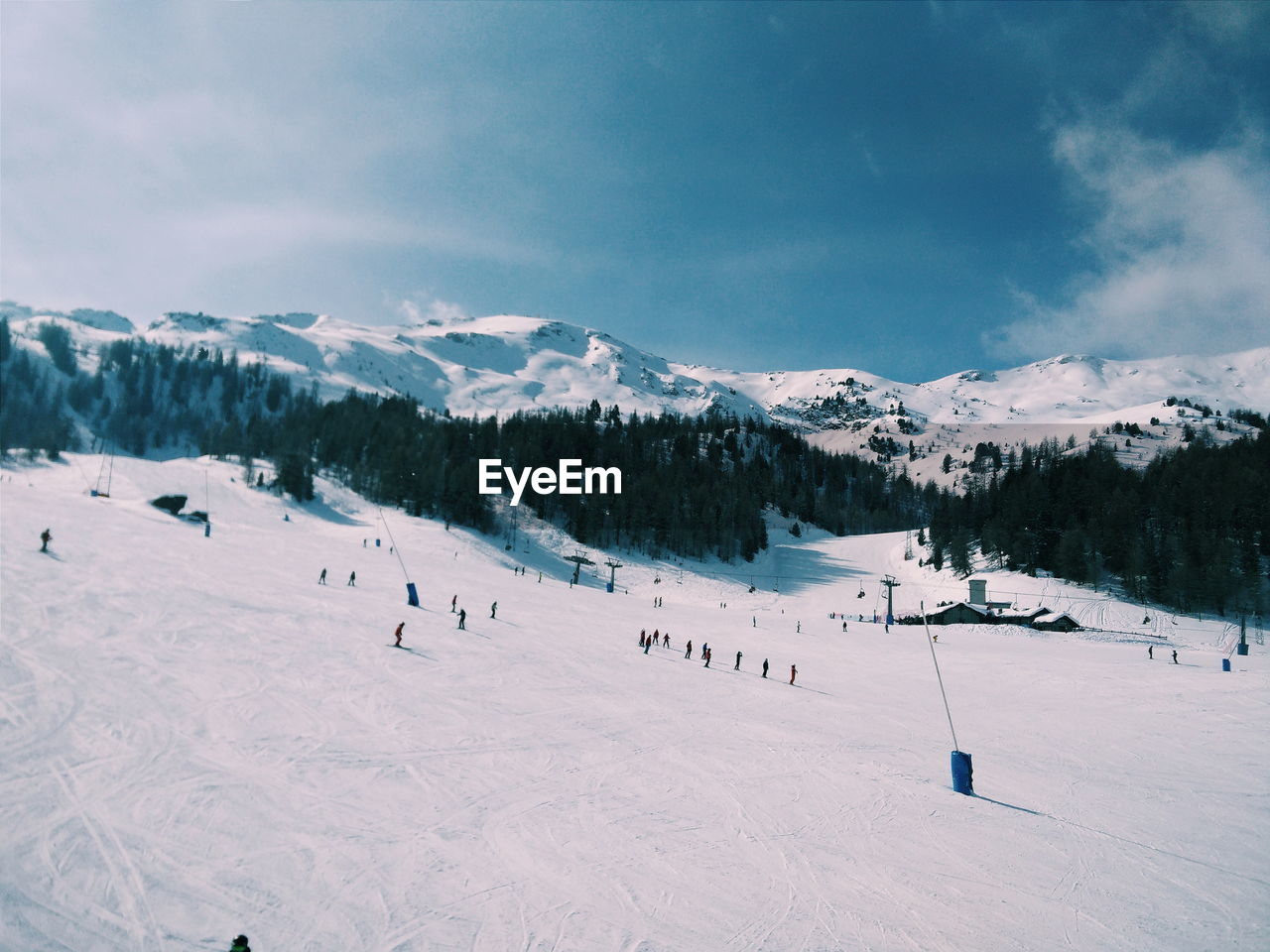 Scenic view of snow covered landscape against sky