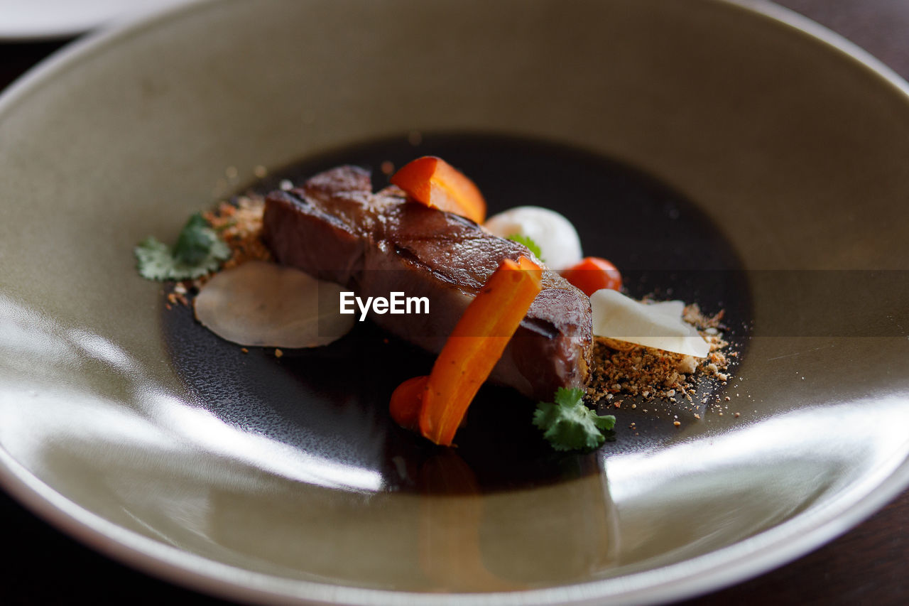 High angle view of beef steak served in plate