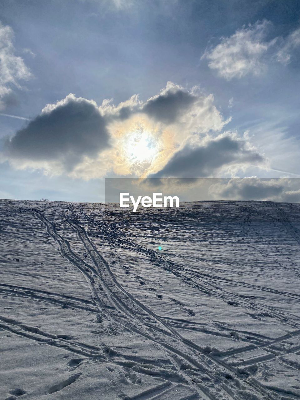 Scenic view of sea against sky during winter