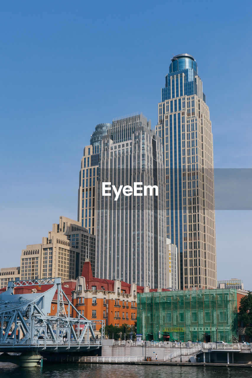 View of buildings against cloudy sky