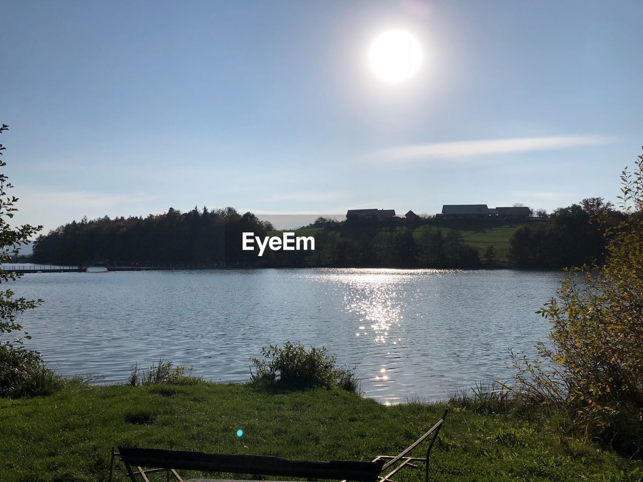 LAKE BY TREES AGAINST SKY