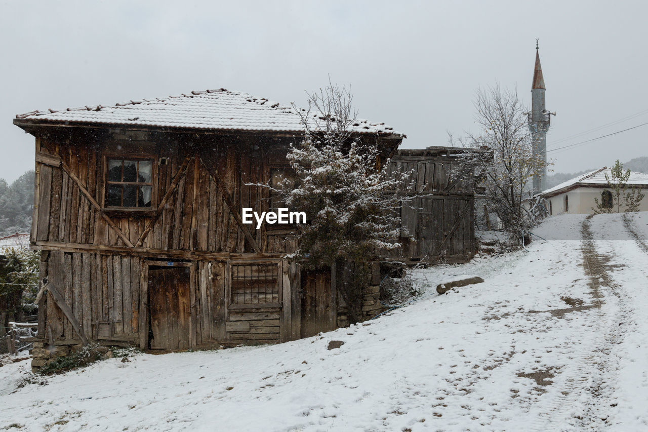 House against sky during winter