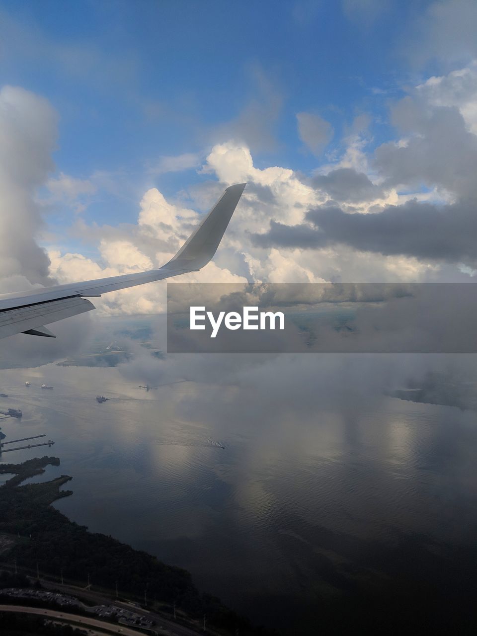 AERIAL VIEW OF CLOUDS OVER SKY