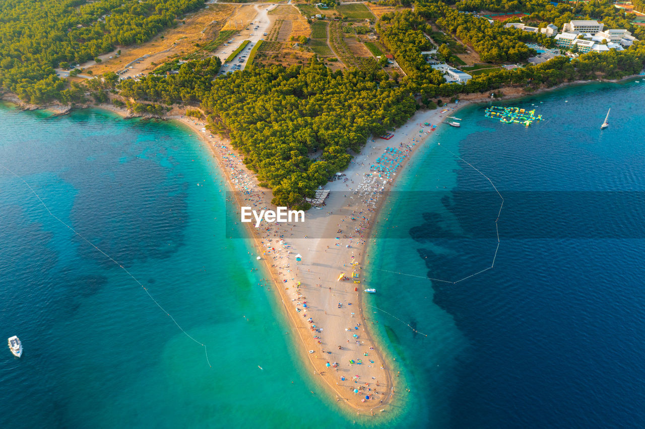 Aerial scene of zlatni rat beach on brac island, croatia