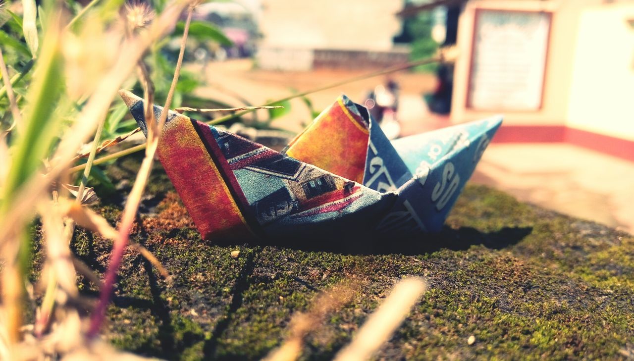 CLOSE-UP OF SHOES OUTDOORS