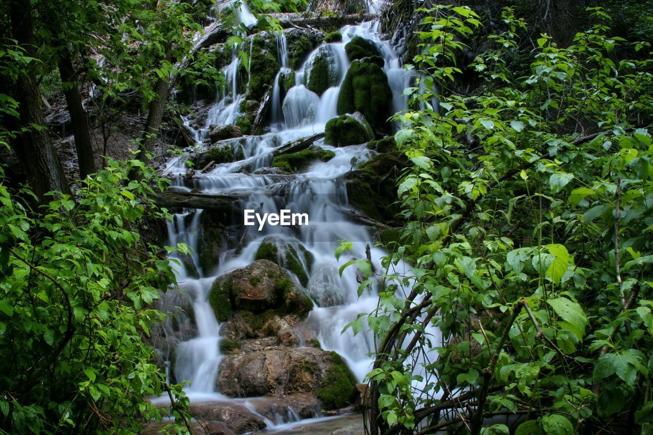 Idyllic view of waterfall at hanging lake