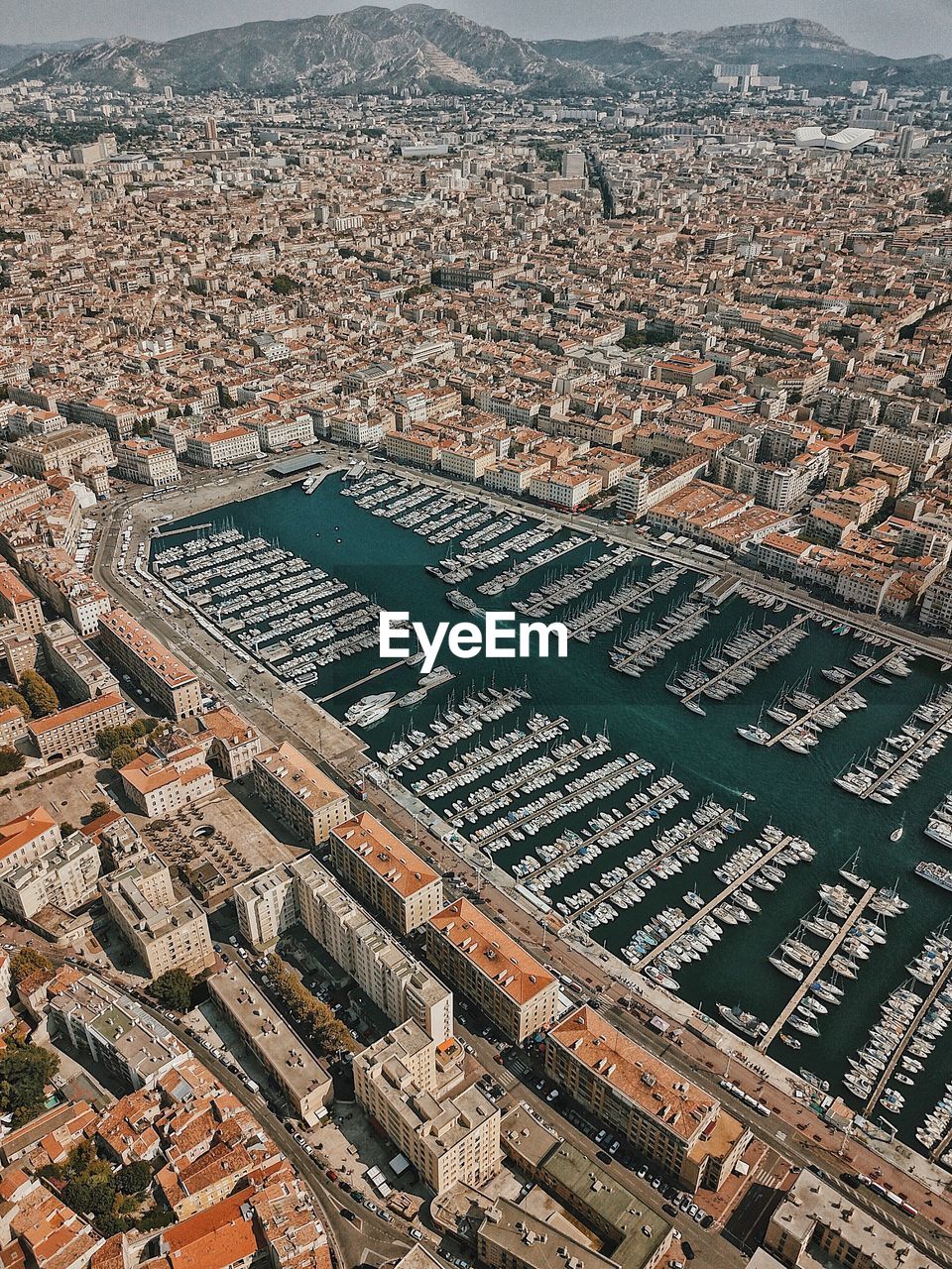 HIGH ANGLE VIEW OF TOWNSCAPE BY BUILDING