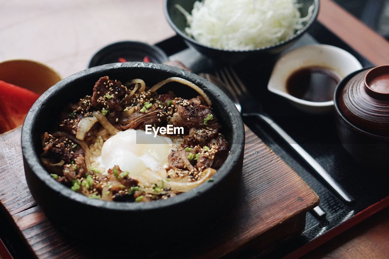 High angle view of gyudon on tray