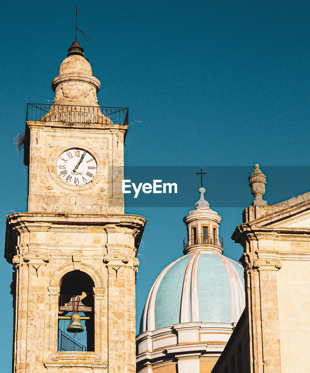 Low angle view of clock tower against sky