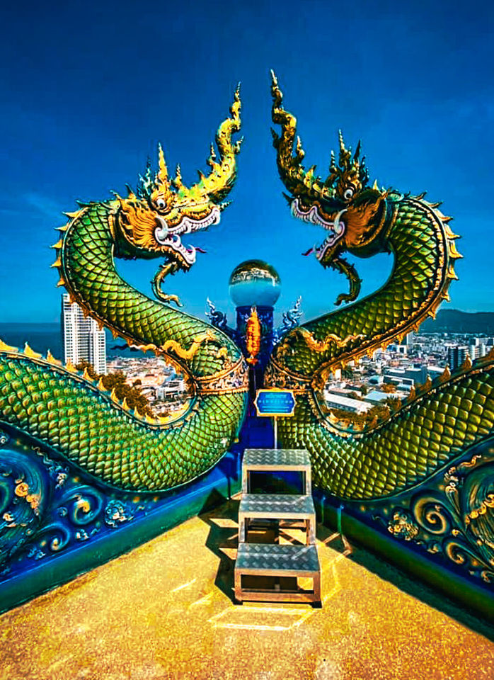 architecture, sky, dragon, religion, blue, travel destinations, built structure, sculpture, nature, history, no people, temple - building, screenshot, travel, belief, tradition, animal representation, outdoors, the past, animal, building, statue, representation, multi colored, spirituality, ornate