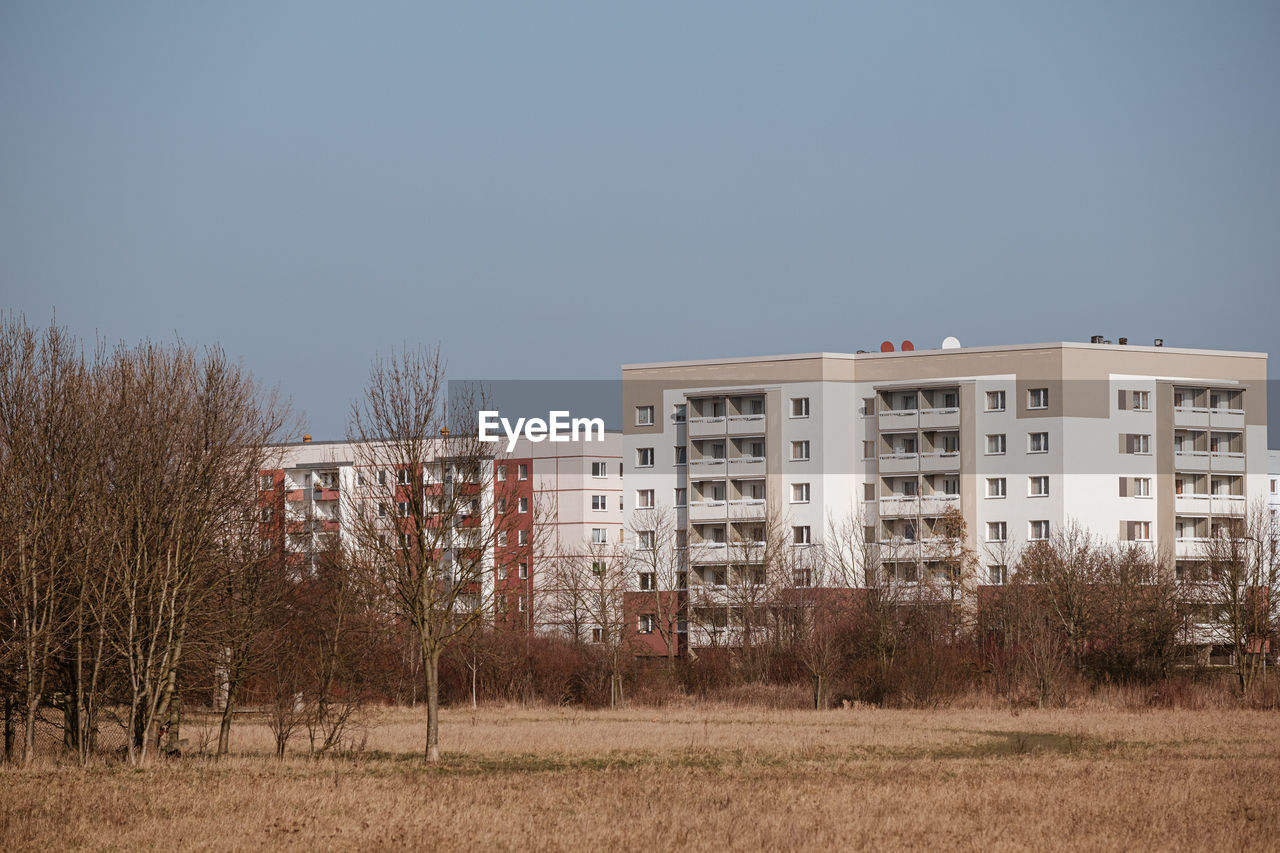 Buildings against clear sky