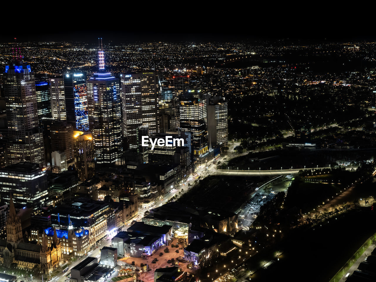 city, architecture, building exterior, cityscape, built structure, night, illuminated, metropolitan area, building, metropolis, office building exterior, aerial photography, skyscraper, skyline, aerial view, urban area, high angle view, travel destinations, landscape, city life, residential district, no people, urban skyline, nature, sky, downtown, bird's-eye view, outdoors, evening, tower, street, downtown district, travel, dusk, office, development, road