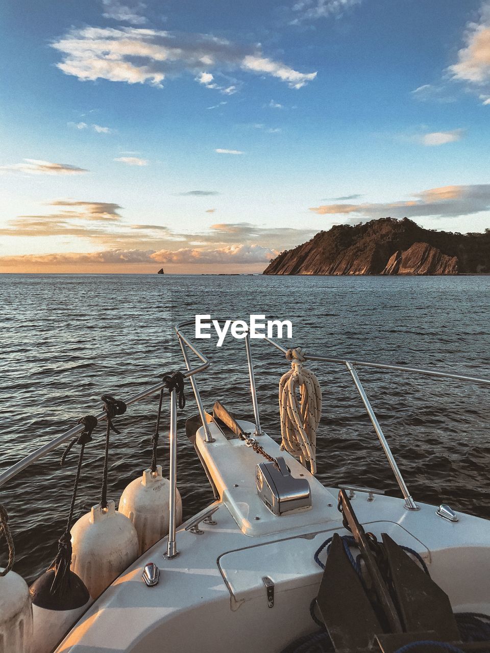 FISHING BOATS IN SEA AGAINST SKY