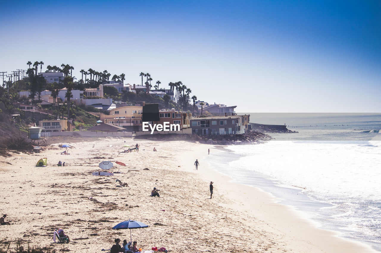 SCENIC VIEW OF BEACH AGAINST CLEAR SKY