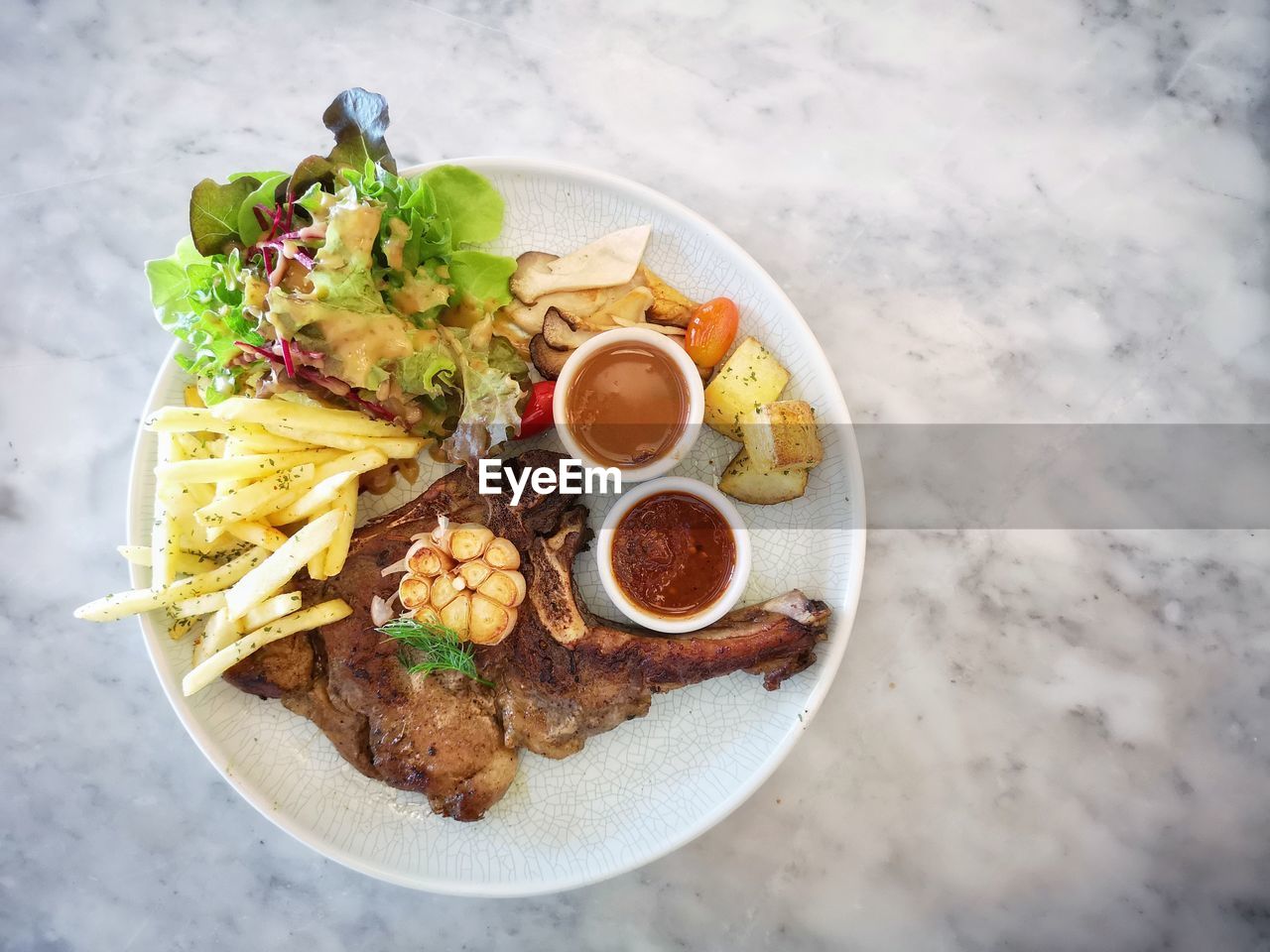 HIGH ANGLE VIEW OF FOOD SERVED ON TABLE