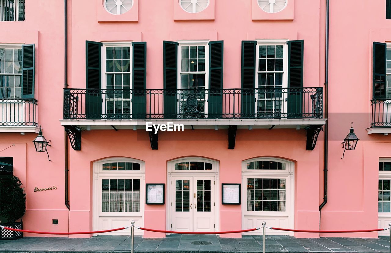 BUILDING WITH PINK WINDOWS