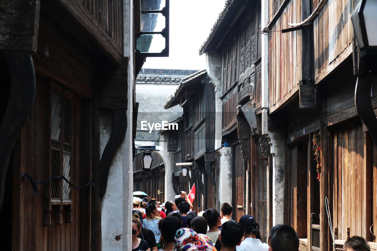 Crowd amidst historical buildings