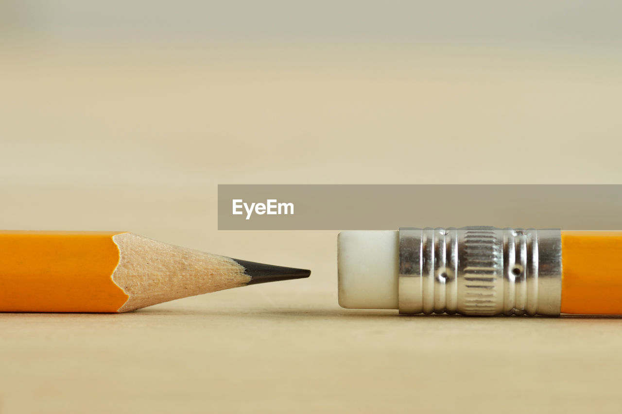 CLOSE-UP OF PEN ON TABLE