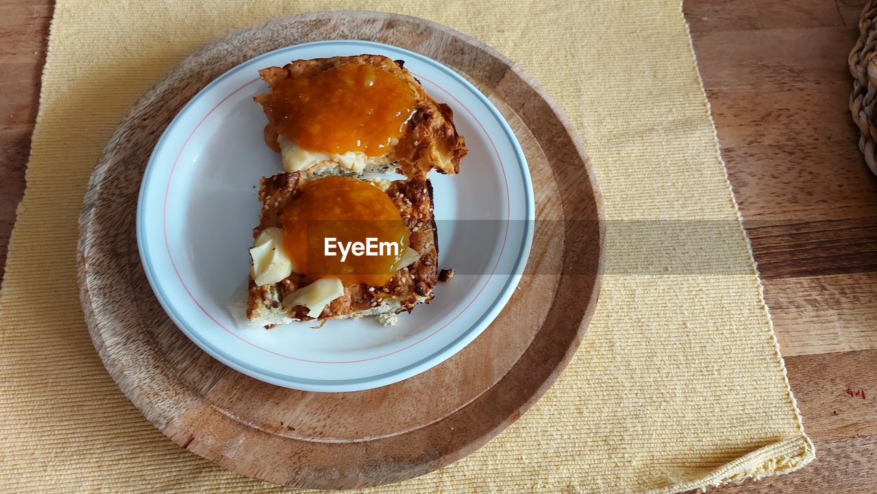 Salt pie baked with cheese. turkey dish. greek food. oriental eating. wooden serving tray. close-up.