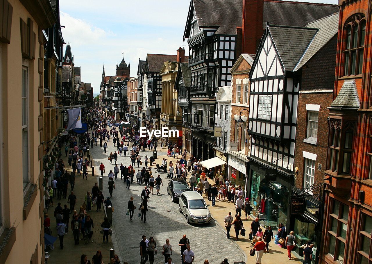 PEOPLE WALKING ON CITY STREET