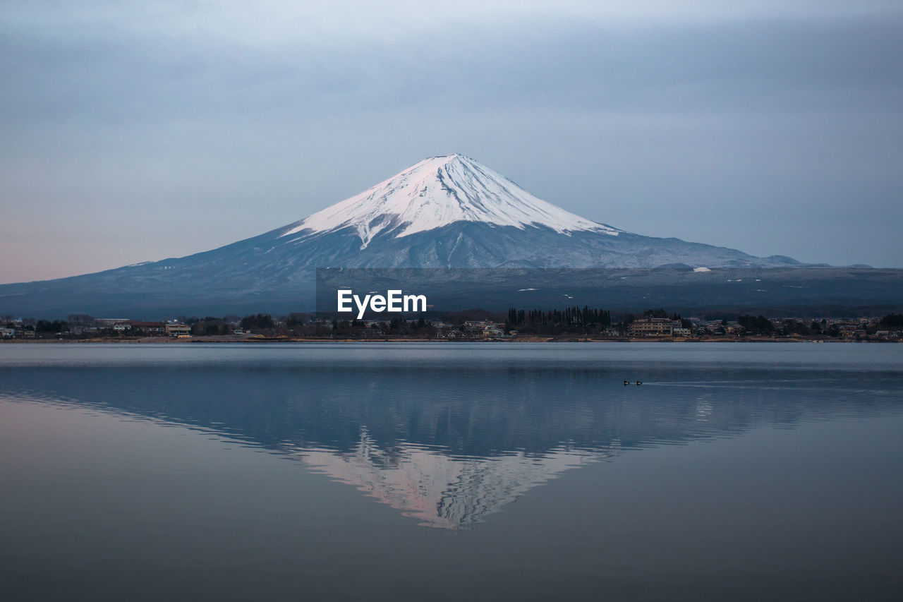 Scenic view of snowcapped mountain against sky