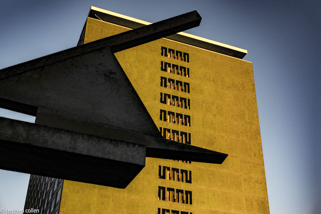 LOW ANGLE VIEW OF BUILDINGS AGAINST SKY