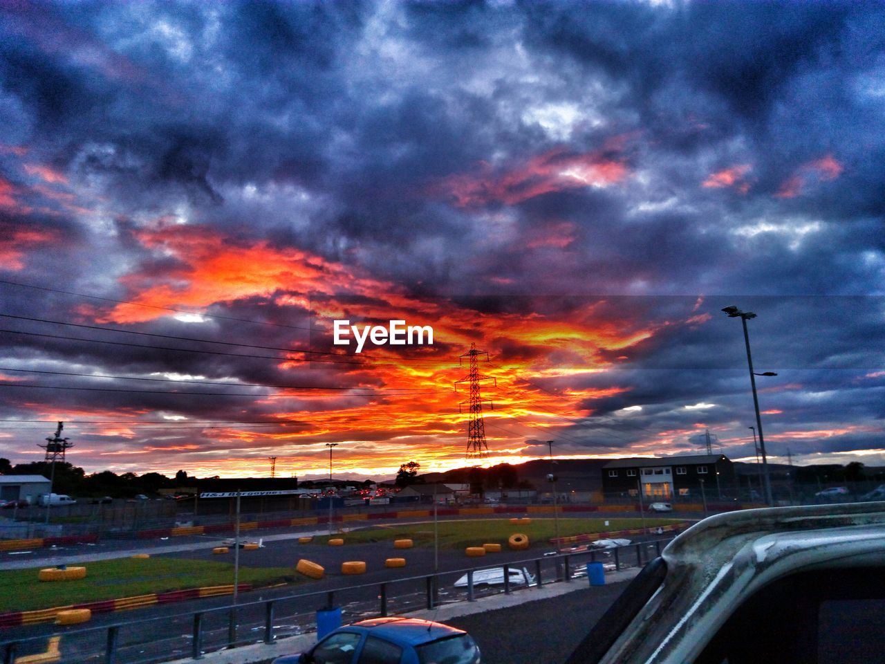 ROAD PASSING THROUGH DRAMATIC SKY