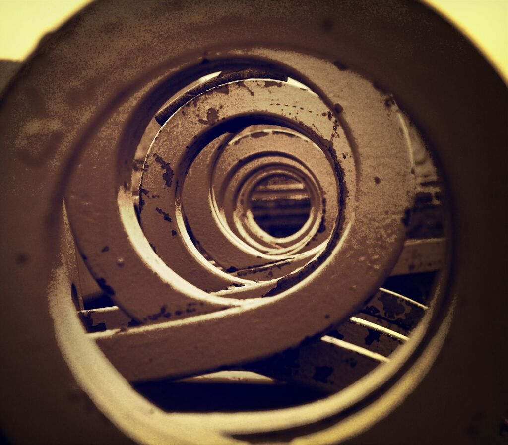 CLOSE-UP OF SPIRAL STAIRCASE