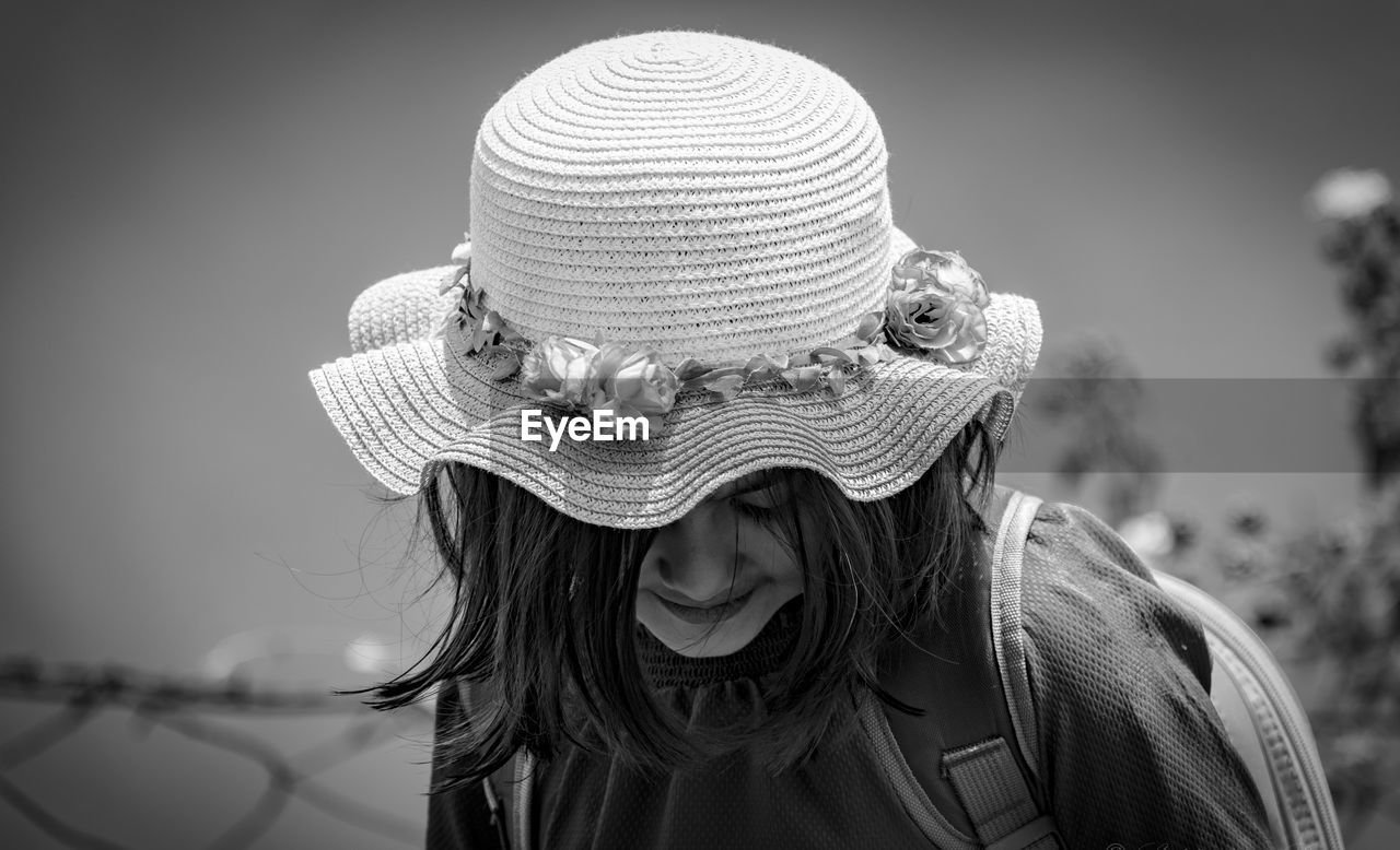 Portrait of woman / child wearing knit hat