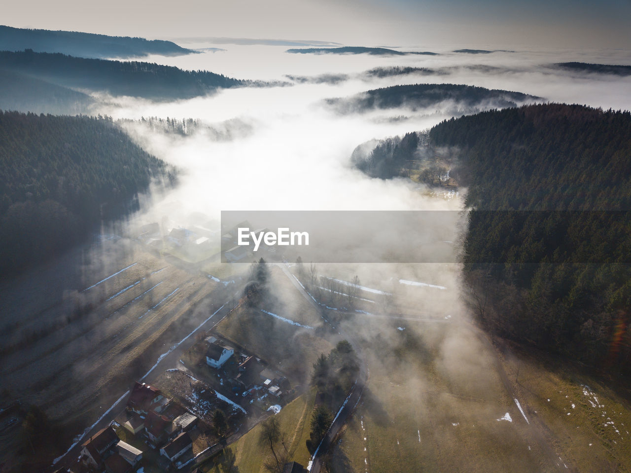 HIGH ANGLE VIEW OF TREES AND LANDSCAPE AGAINST SKY