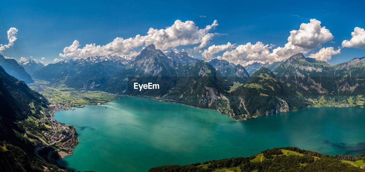 Panoramic view of lake and mountains against sky