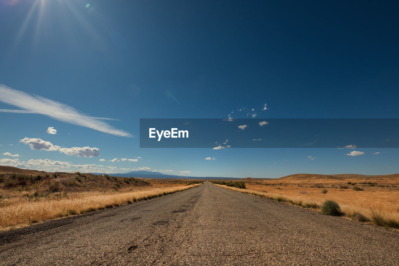 Deserted road in arid landscape