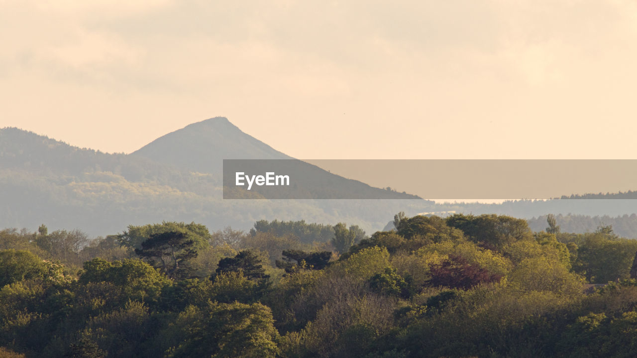 Scenic view of mountains against sky during sunset