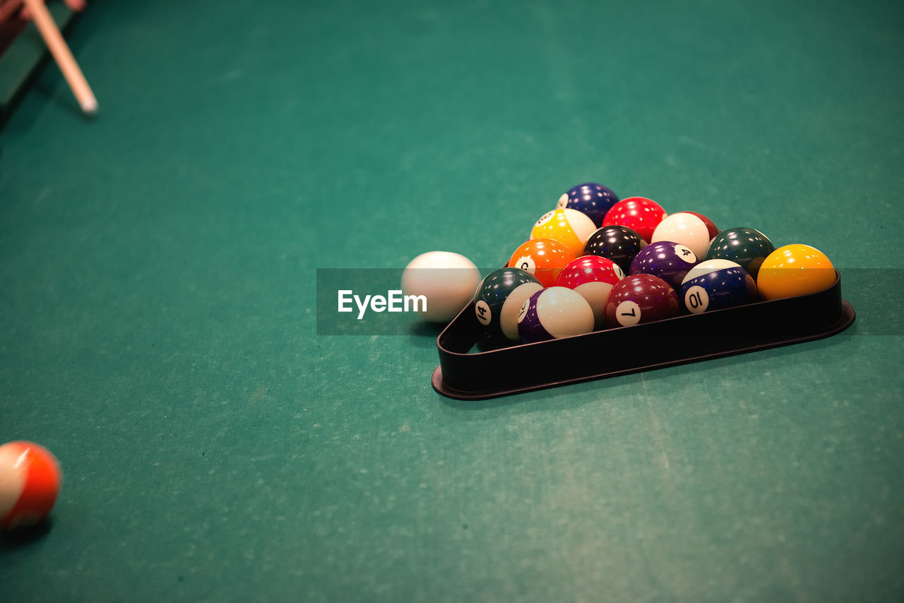 Close-up of pool balls on table