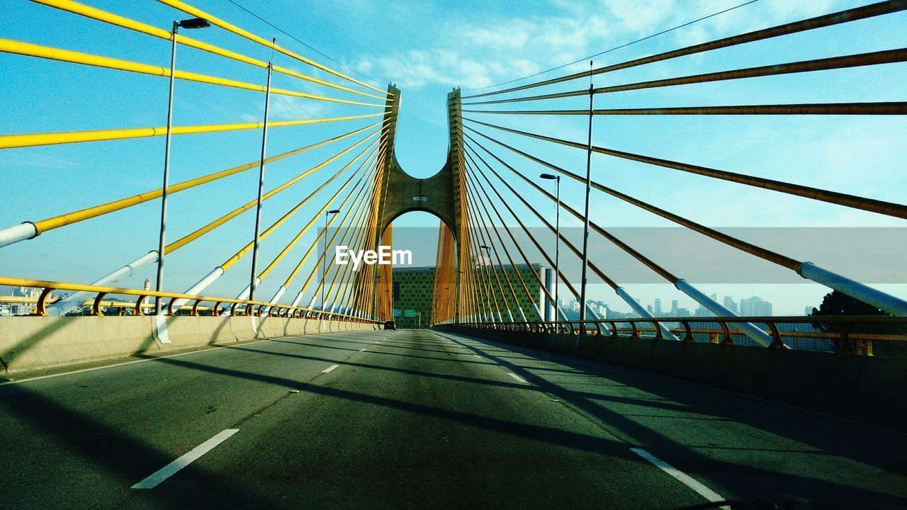 Suspension bridge against sky