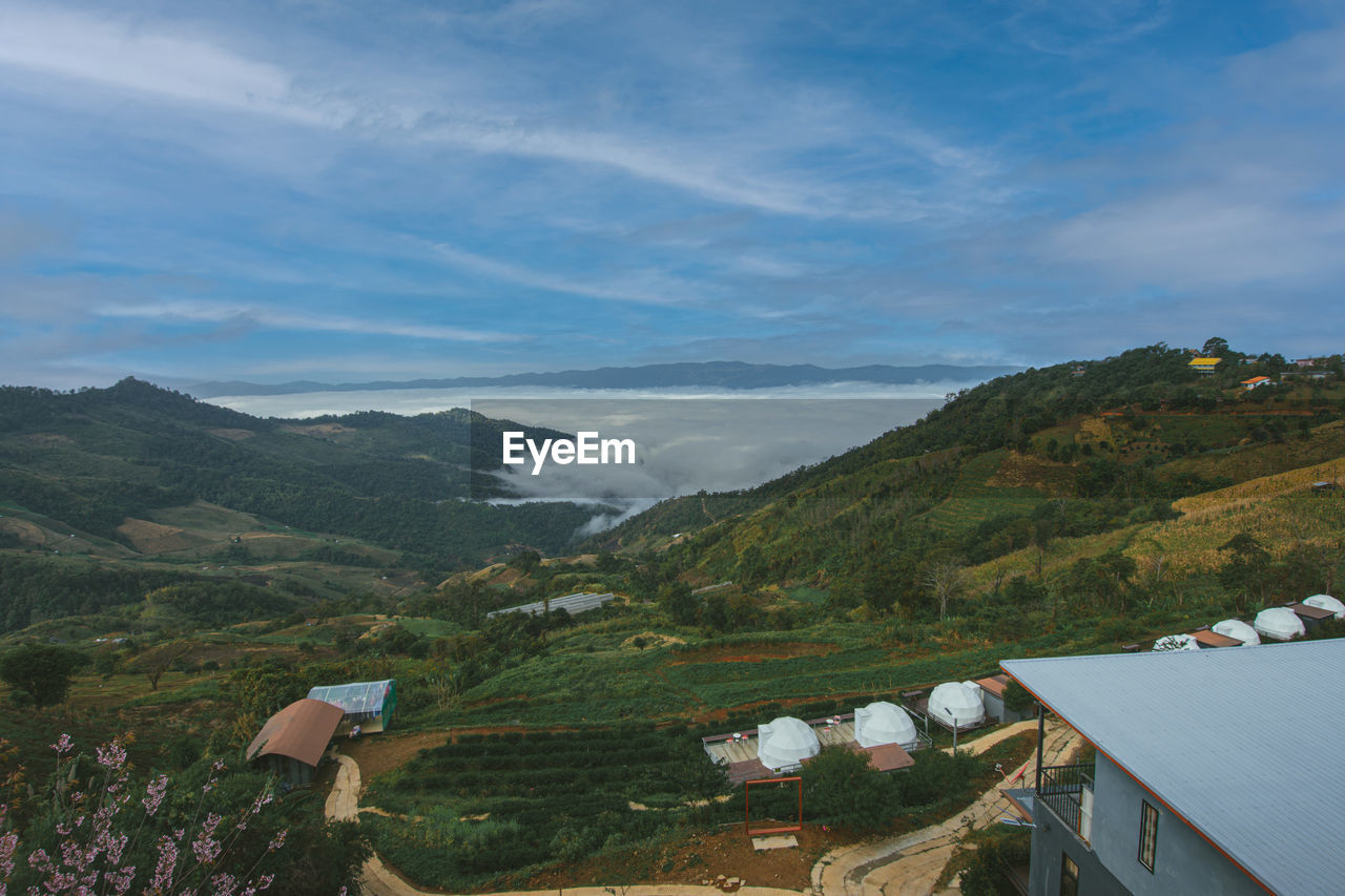 Beautiful blue sky high peak mountains mist fog wildlife green forest at changrai