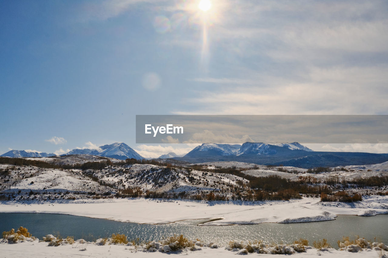 SNOWCAPPED MOUNTAINS AGAINST SKY