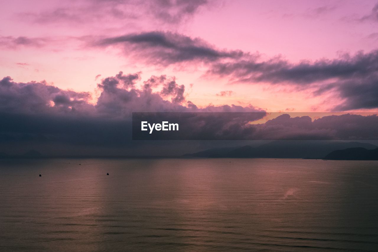 Scenic view of sea against sky at sunset