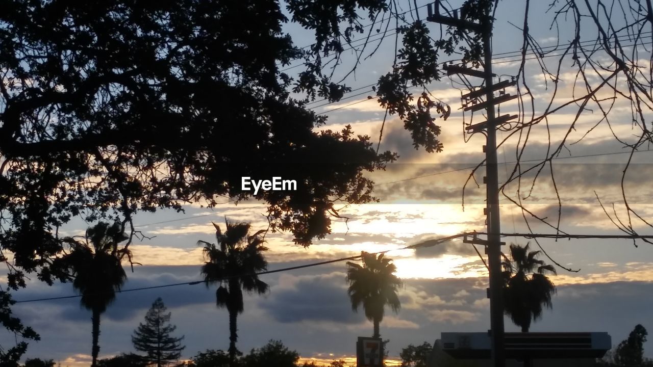 VIEW OF CLOUDY SKY AT SUNSET