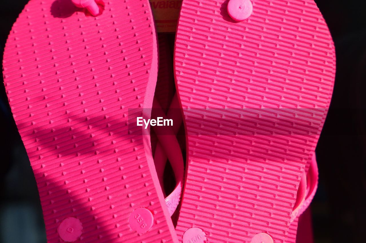Close-up of pink flip-flop