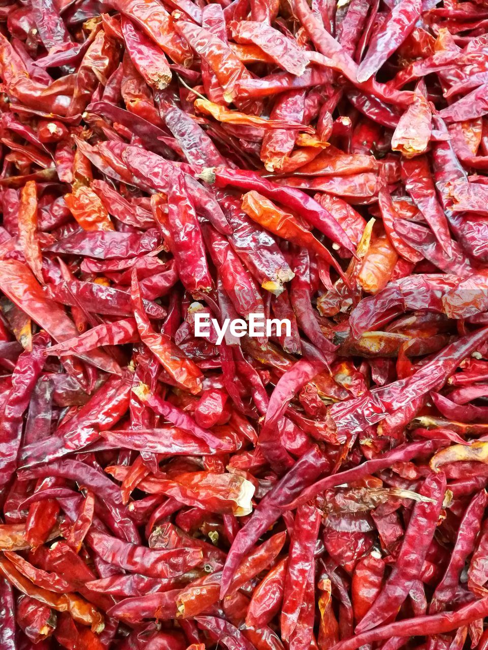 Full frame shot of dried red chili peppers for sale
