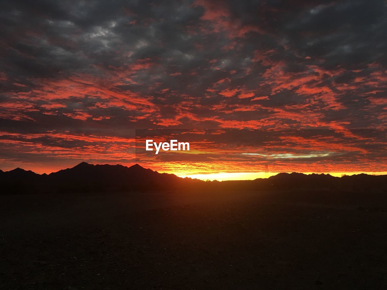 DRAMATIC LANDSCAPE AT SUNSET