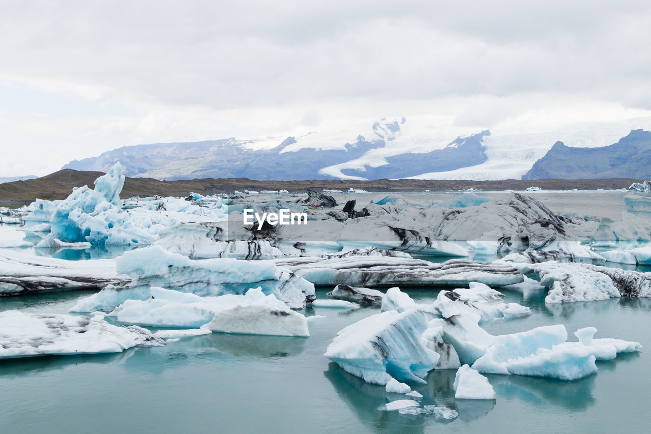 SCENIC VIEW OF SNOW COVERED LANDSCAPE