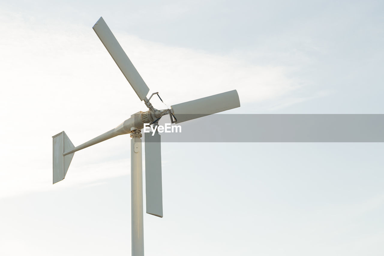 low angle view of wind turbine against sky