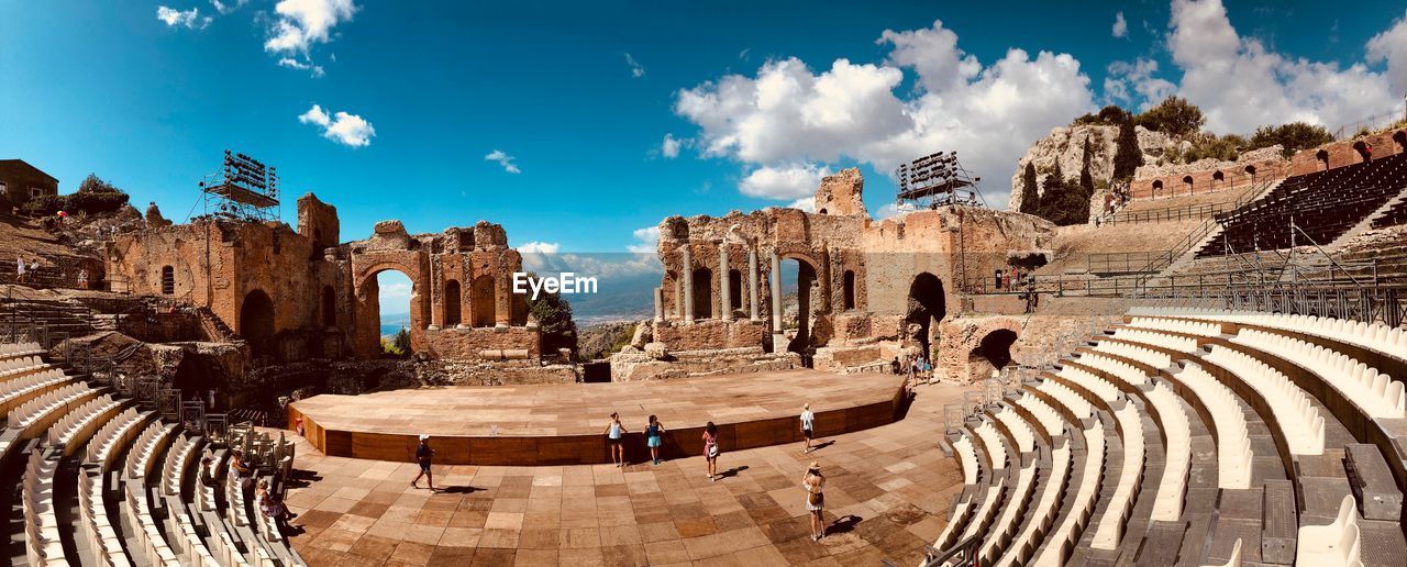 Panoramic view of old amphitheater against sky in city