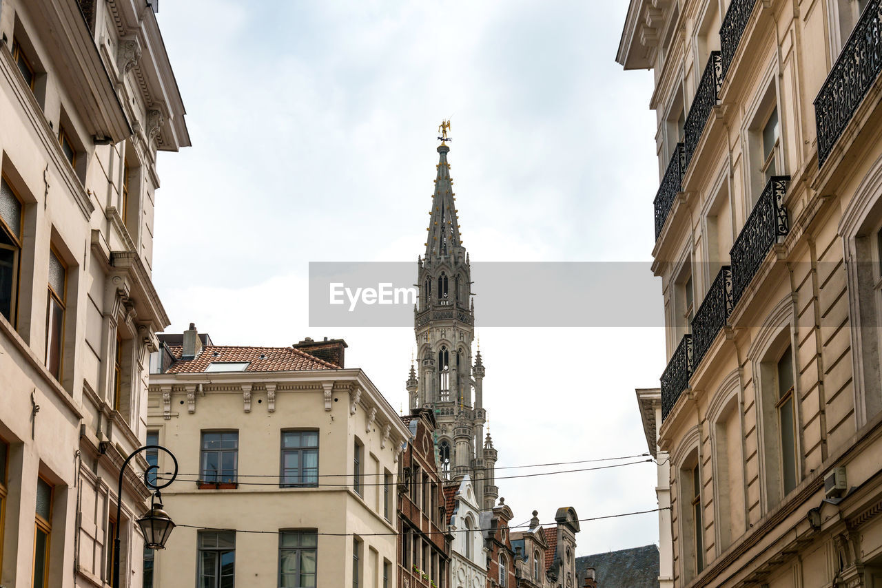 Low angle view of town hall at grand palace against sky