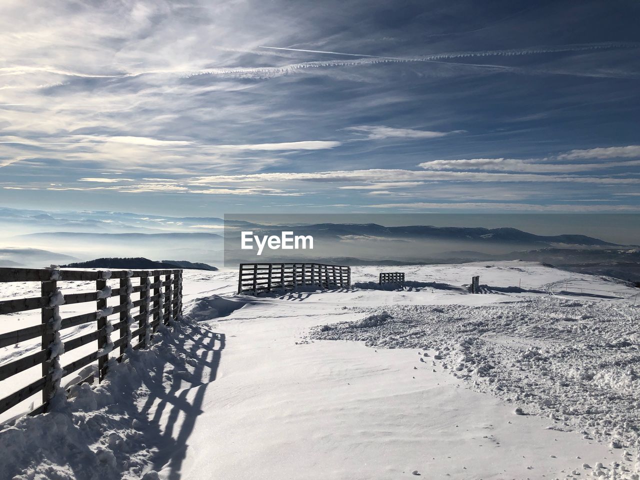 Scenic view of sea against sky during winter