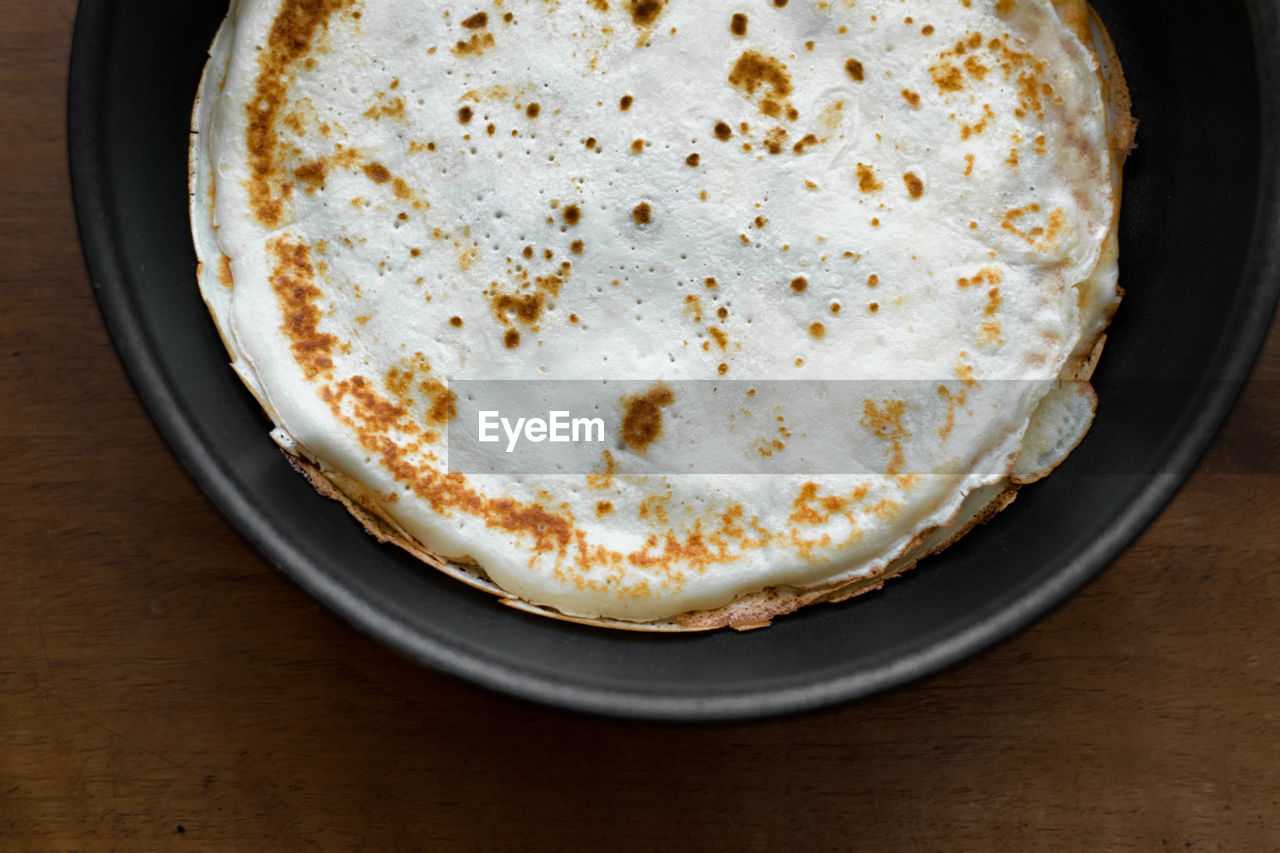 High angle view of flat bread in plate on table