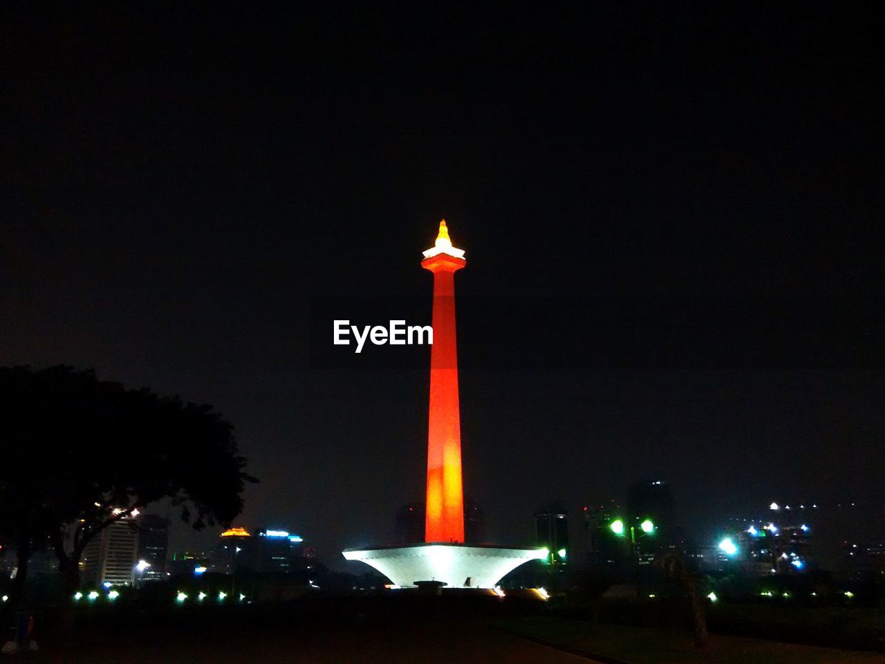 Low angle view of illuminated monument at night